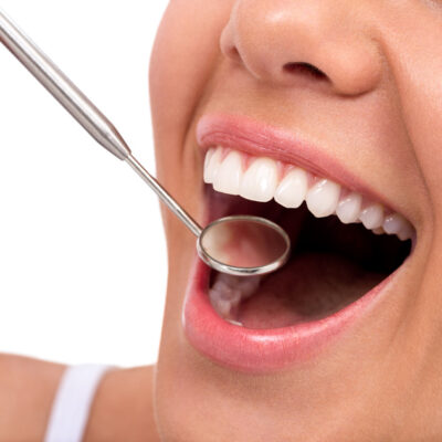 Great healthy smile with dentist mirror, dental care